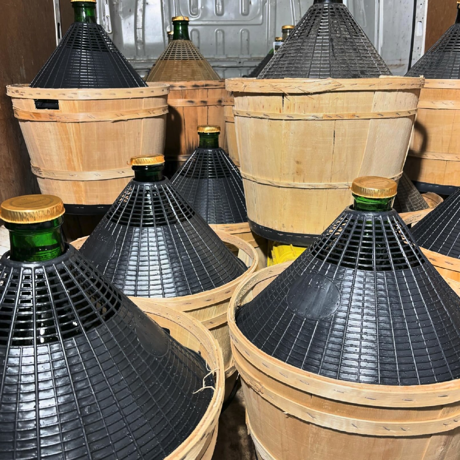 Photo of bulk wine demijohns